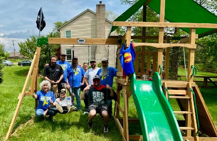 Roc Solid Playset Build with Volunteers and a Little Superhero