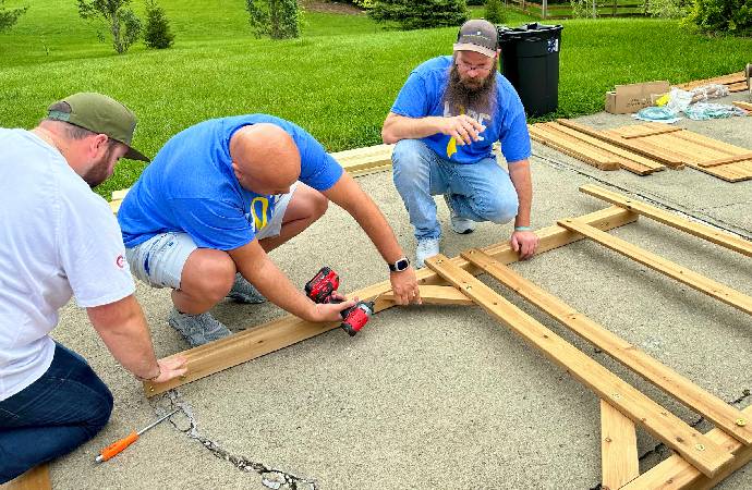 Roc Solid Playset Build with Volunteers and a Little Superhero