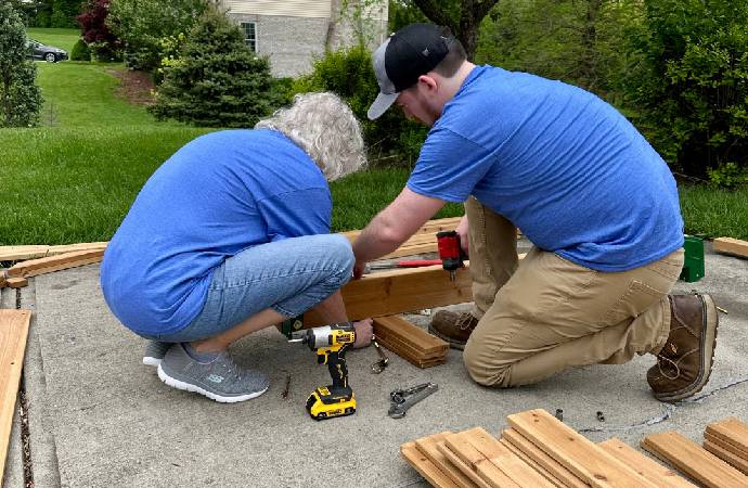 Roc Solid Playset Build with Volunteers and a Little Superhero