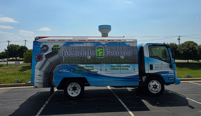 Teasdale Fenton air duct cleaning service truck parked outdoors