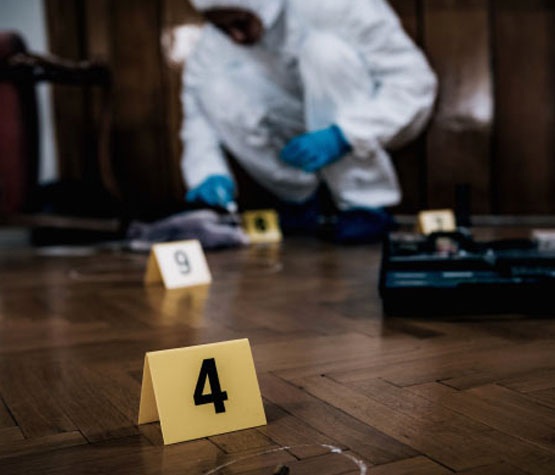 Professional cleaning up a biohazard scene