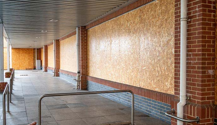 Boarded-up commercial property window
