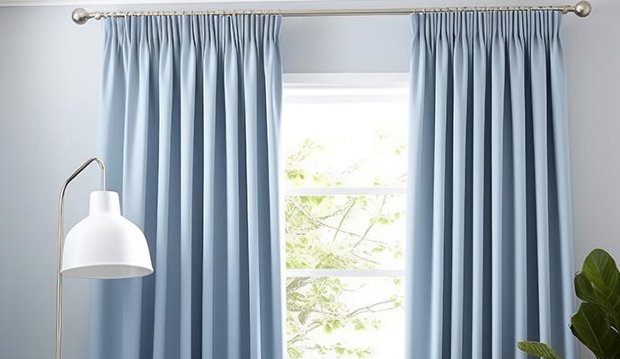 Beautiful clean drapery hanging on window