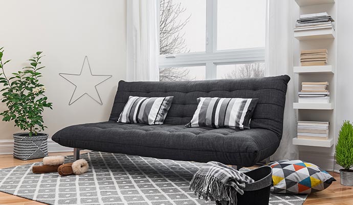 A clean futon in the room