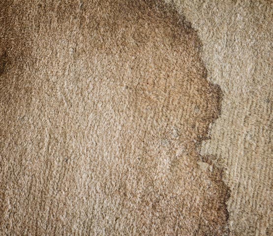 Close-up view of a stained carpet