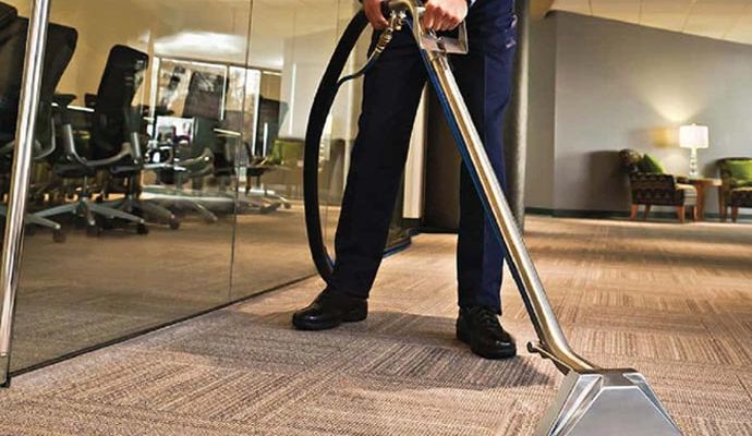 Commercial carpet cleaning with vacuum cleaner