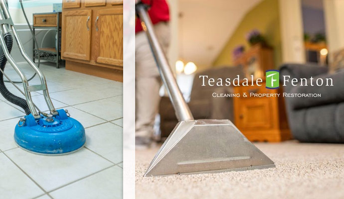 Worker cleaning carpet and floor