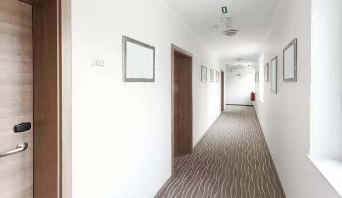 Clean carpet in apartment corridor