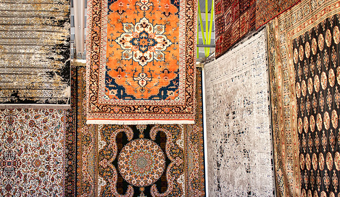 Colorful rugs stored in a facility