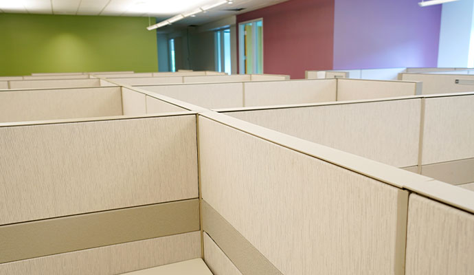 Close-up of beige cubicle partitions in an office