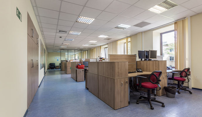 Modern workspace with wooden cubicle partitions