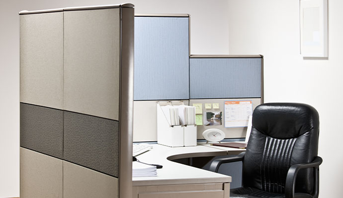 Workstation with gray and blue cubicle panels