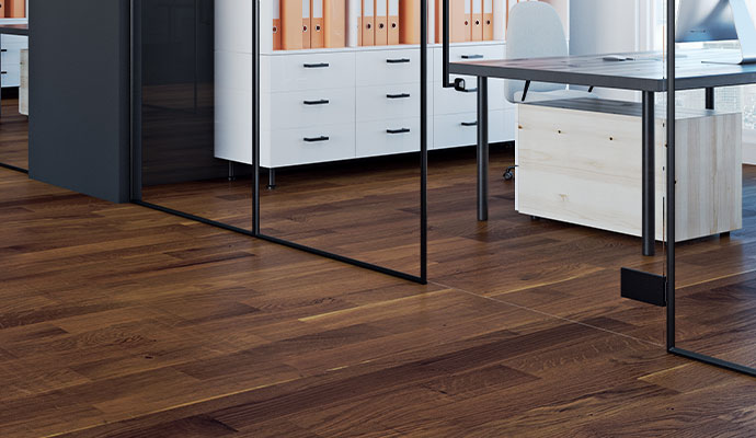 Dark hardwood flooring in a contemporary office space