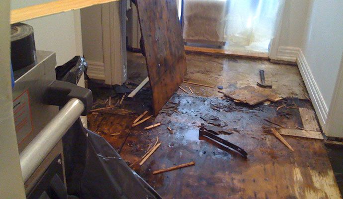 Floor severely damaged by water