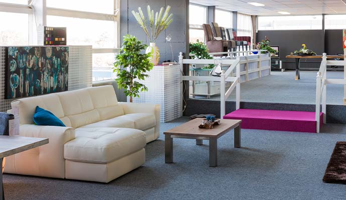 Interior view of a modern furniture store showroom after smoke odor removal service