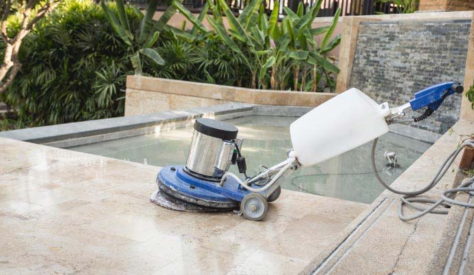Professional marble and stone floor polishing in progress