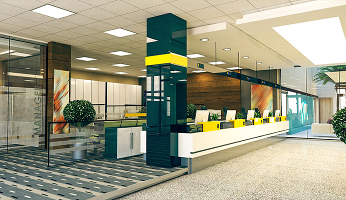 Modern bank lobby and teller counter with clean carpet flooring