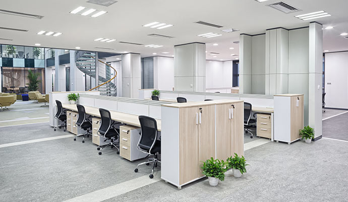 Modern commercial office environment with organized workstations