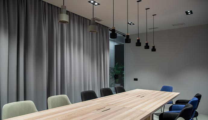 Modern meeting room with clean gray drapery
