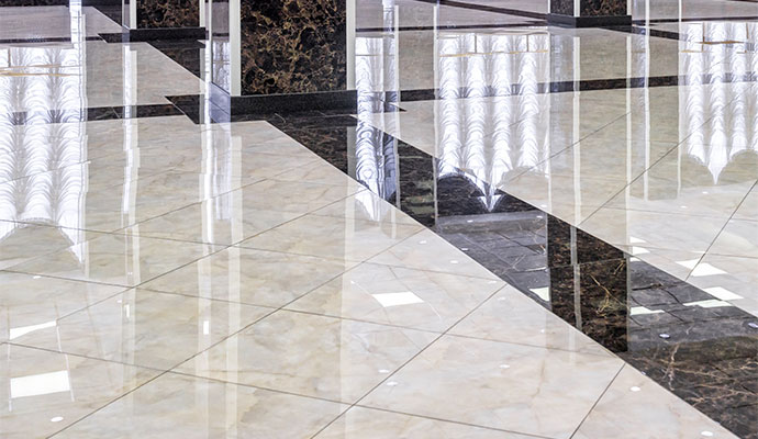 Polished marble and stone flooring with glossy finish