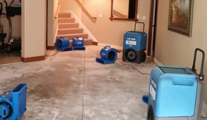 residential water damage restoration with equipment