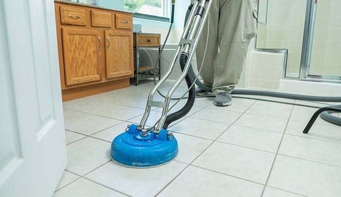 Professional tile and grout cleaning in progress