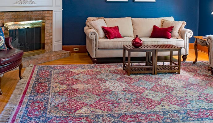 Clean rug on wooden floor inside living room