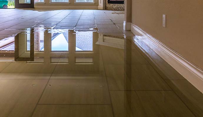 Water damage on residential flooring with standing water