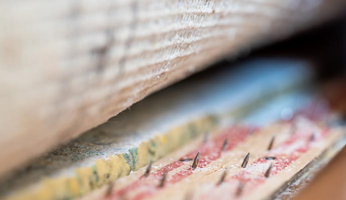 Under carpet padding and tacks