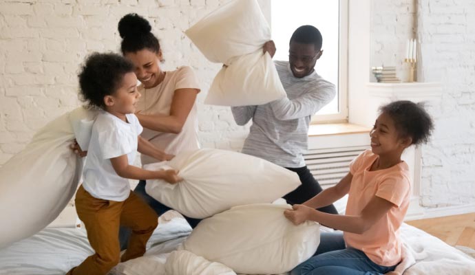 Family playing in a clean room